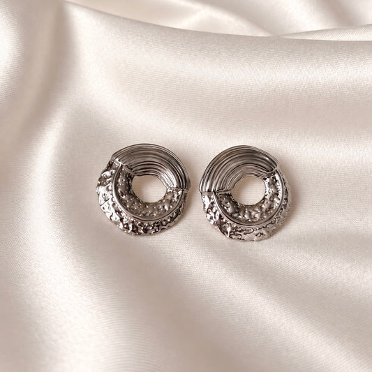 Boucles d'oreilles · Arcane