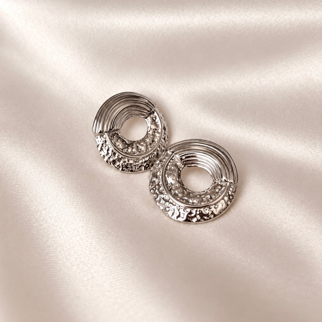 Boucles d'oreilles · Arcane