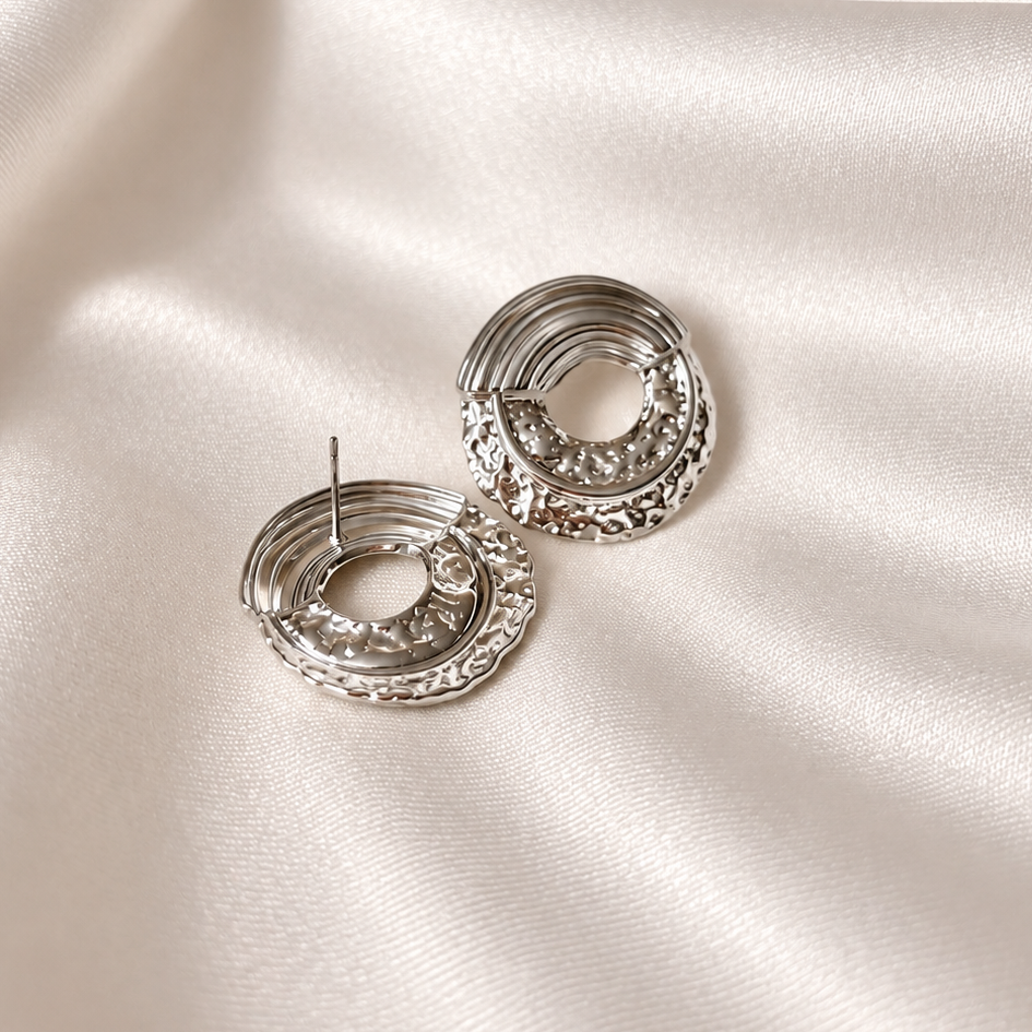 Boucles d'oreilles · Arcane
